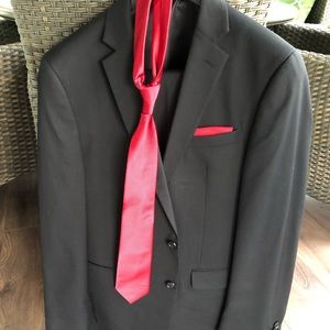 Black 3 piece suit with red tie and scarf, worn once, pants size 31